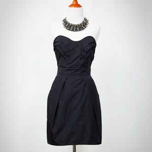 Black strapless taffeta dress by BCBG
